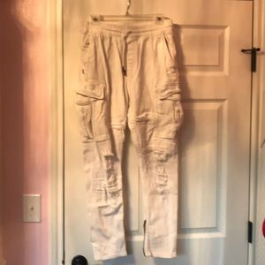 Skinny distressed white jeans